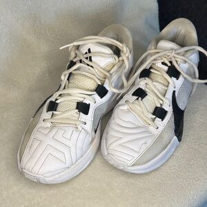 Nike White and Black Athletic Sneakers zoom freak 5 basketball